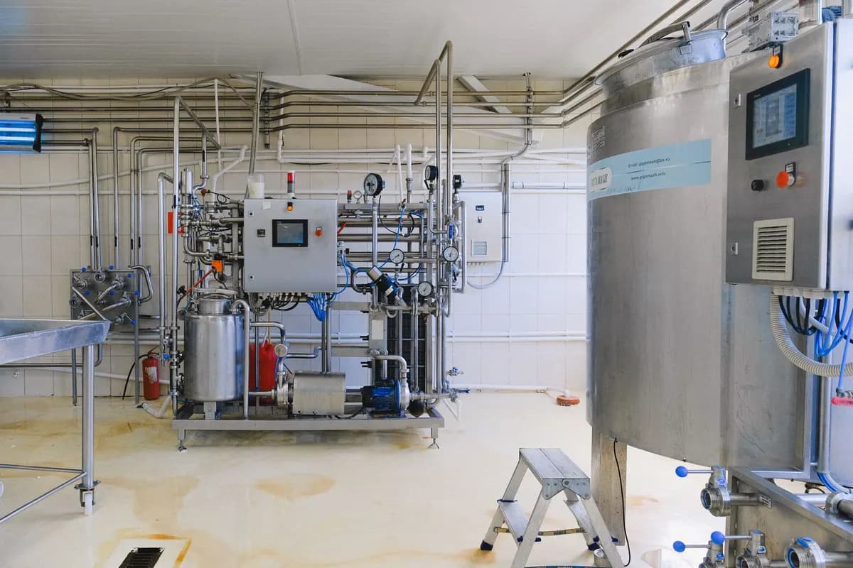 Pharmaceutical process plant with stainless-steel tanks and piping